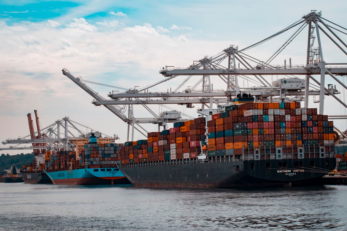 Container vessels being loaded at berth